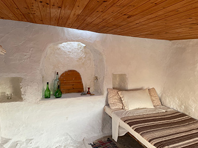 Image of the 'Bakehouse' bedroom in Henry's Amorgos house in Langatha, langada, Lankada